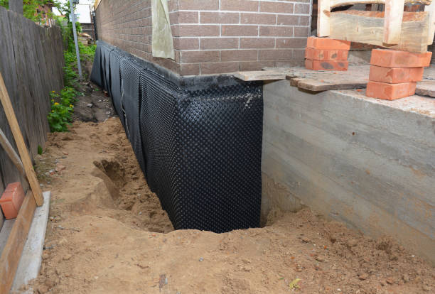 Happy homeowners after waterproofing job in Potterville